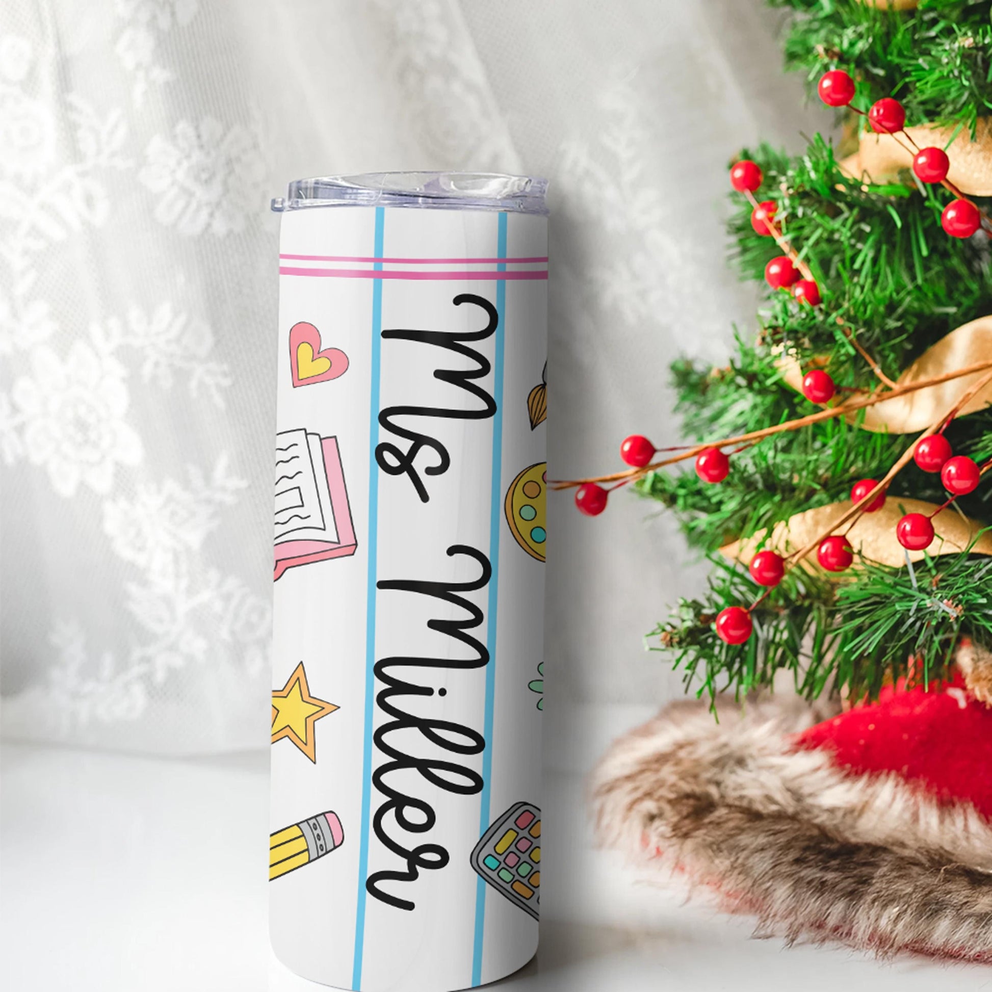 Adorned with cheerful school doodles and a lined-paper style, this tumbler is both whimsical and functional. With your teacher’s name printed on it, it’s the perfect way to show your appreciation while keeping their drinks stylishly sippable!