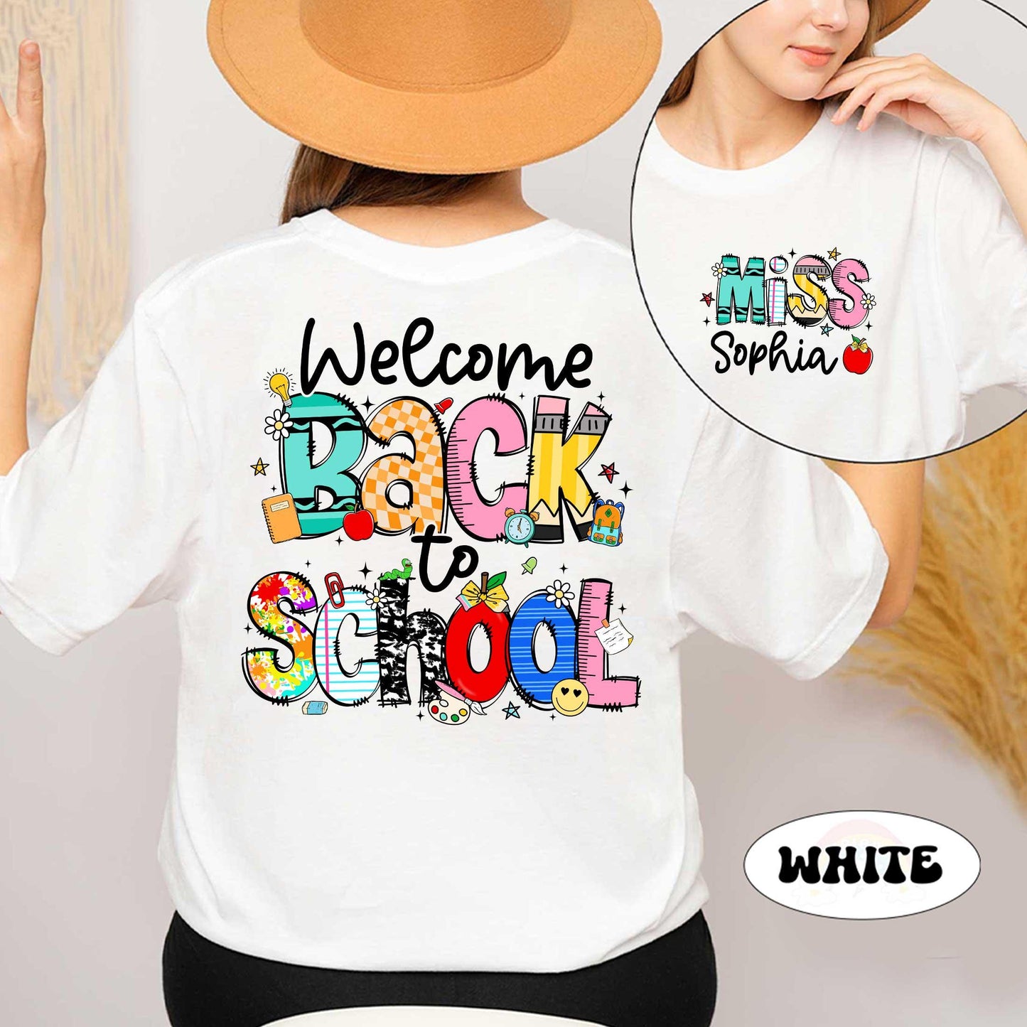 May include: A white t-shirt with the text &#39;Welcome Back to School&#39; in colorful letters with school-themed illustrations. The back of the shirt has the text &#39;Miss Sophia&#39; in colorful letters with a red apple illustration.